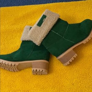 Green boots. All man made materials. Never worn